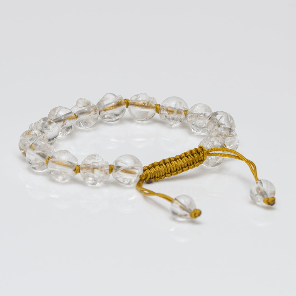 Hand Carved Clear Quartz Skull Bracelet